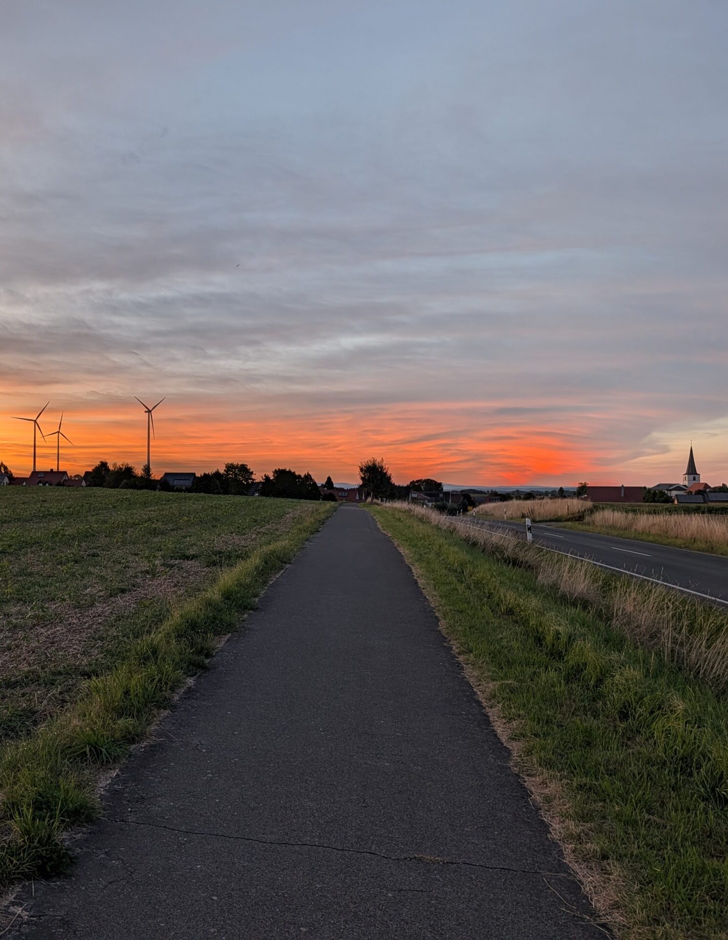 Frankenwinheim_Radweg_Sonnenuntergang Blick vom Radweg nach Lülsfeld Richtung Frankenwinheim im Sonnenuntergang